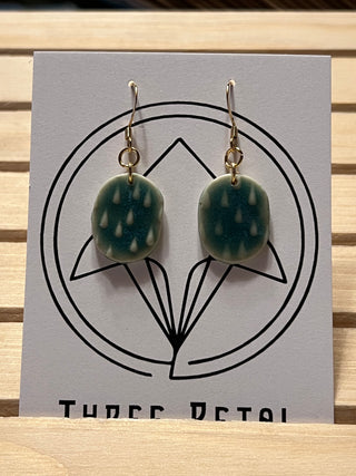 Earrings / green pottery bead